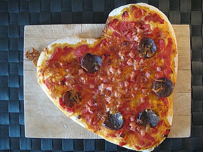 http://www.wikihow.com/Make-a-Heart-Shaped-Pizza