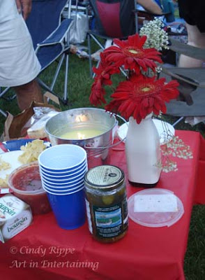 #Red flowers and tablecloth, # Picnic at Ravinia, #Outdoor Concert, #Florals-Family-Faith, #Cindy Rippe