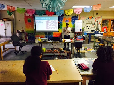 African american paper cut artist presentation