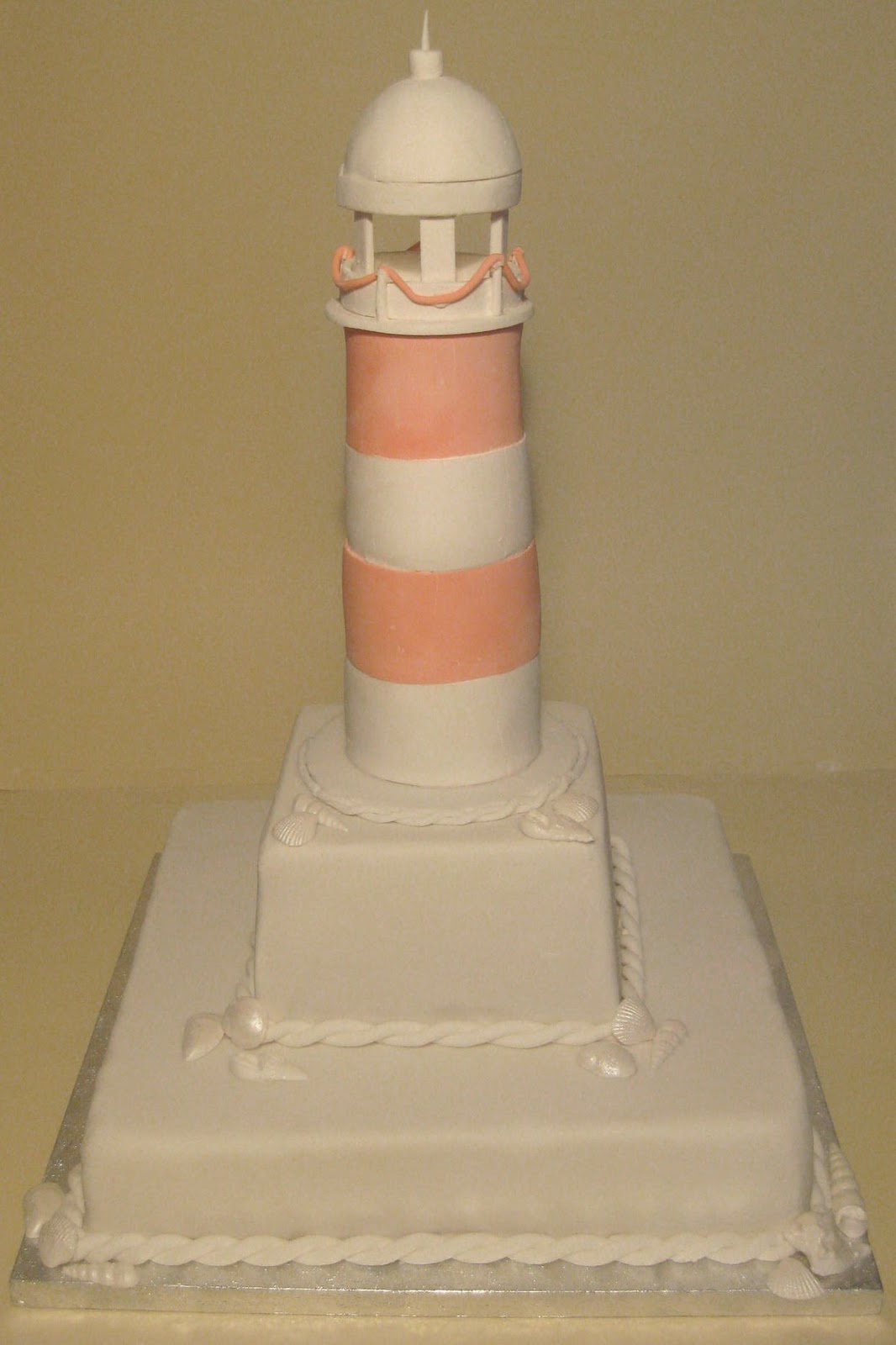 feed my face with cake  Lighthouse Wedding Cake 