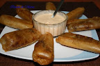 ROLLITOS DE LOMO SALTADO Y CREMA DE ROCOTO