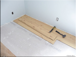 installation of laminate flooring in progress