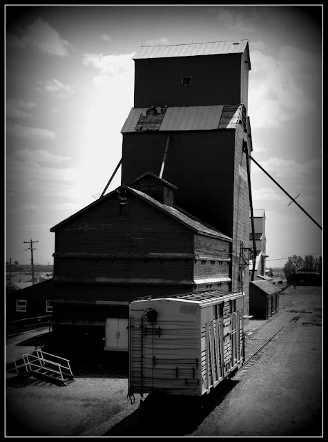 Grain Elevators and rail car in Nanton Alberta Black and White 