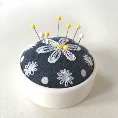 https://www.sumoftheirstories.com/blog/2018/polka-dot-embroidered-pin-cushion