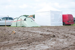 Camping at a muddy festival