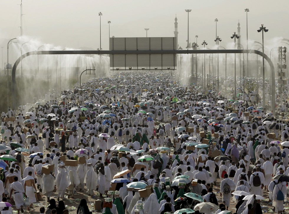 70 Of The Most Touching Photos Taken In 2015 - Two million Muslim pilgrims walk on roads in Mecca during the annual Hajj. At least 717 died following a stampede during the stoning of the devil.