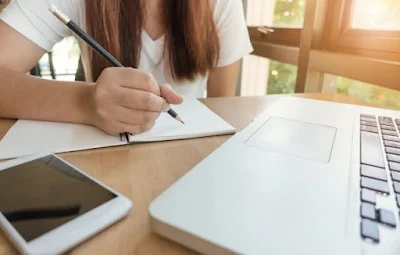 Student working in classroom.