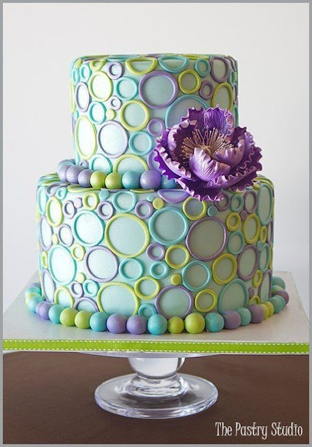 This cake just makes me smile Purple teal and green wedding cake 