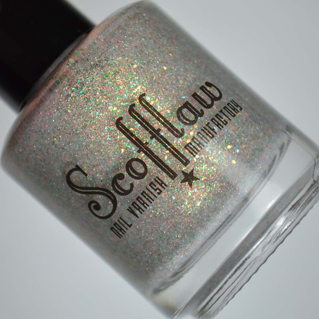 grey glitter nail polish in a bottle