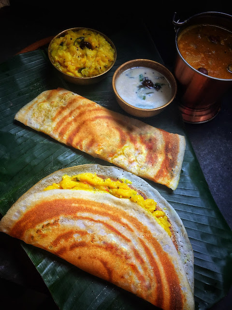 Delectable Masala Dosa, a popular South Indian dish known for its crispy texture and aromatic potato filling.