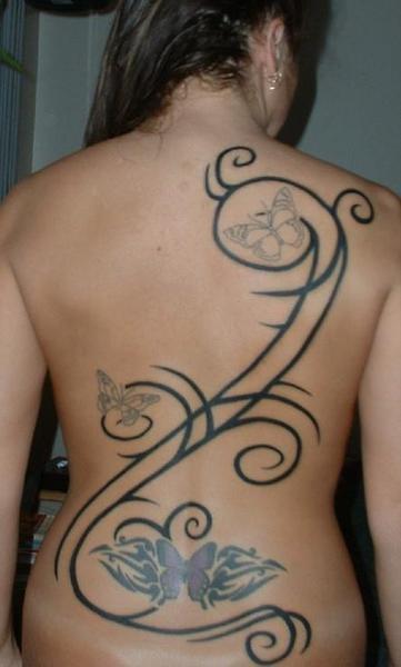 tribal girly tattoos 3,bees tattoos,areis tattoo pics:I have a tribal band