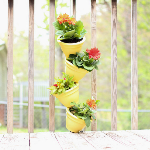 7. lovable planter with yellow top.