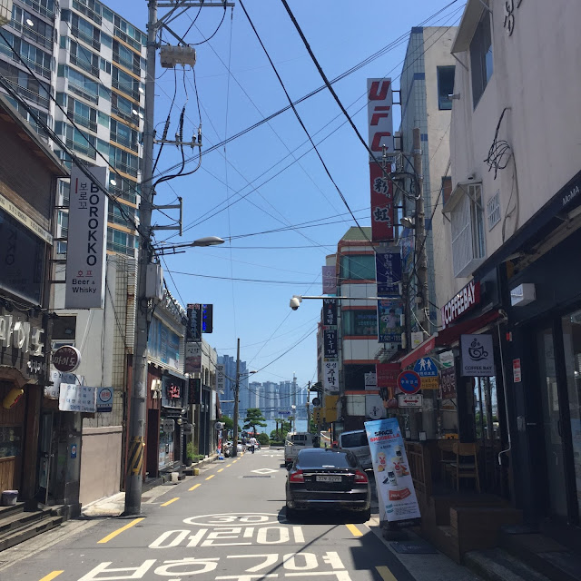 A street leading down to Gwangalli Beach in Busan, South Korea.