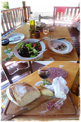 French lunch of cheeses,meats, bread, olive oil, wine