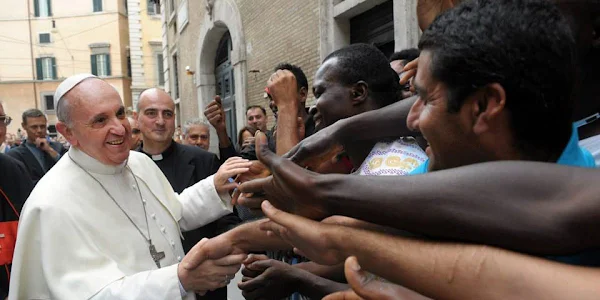 Pope Francis with refugees