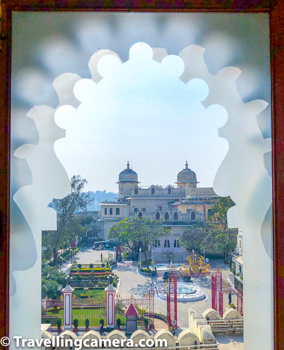 Above photograph shows the part of Udaipur City Palace where royal family lives. Arvind Singh Mewar along with his family live in the palace you see above. This photograph is clicked through one of the windows where musical instruments are showcases in City palace of Udaipur.