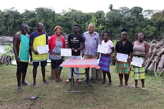 " Some participants of the training receiving their certificates"