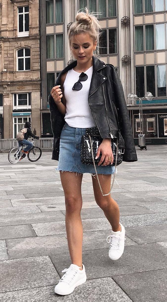 how to style a skirt : black leather jacket + white top + bag + sneakers