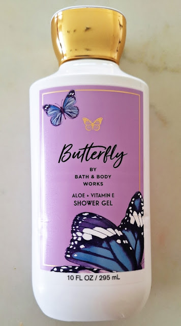 Bath & Body Works’ Butterfly Shower Gel, 10 oz, in white & lavender packaging with gold, blue & purple butterflies & gold top