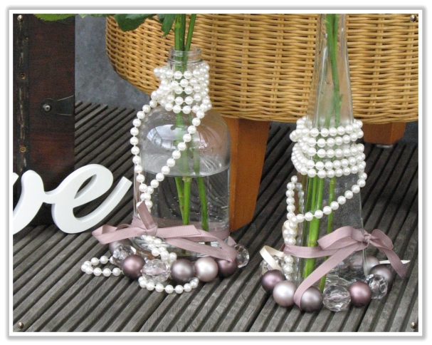 Recycle liquor bottles for a cute rustic wedding centrepiece here 4 diy 