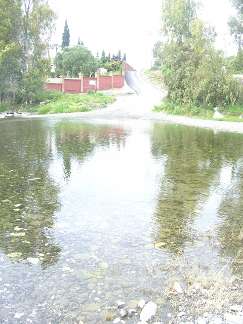 Crossing a river on a bike in Costa Del Sol