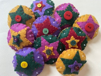 Felt Christmas ornaments with stars and beads