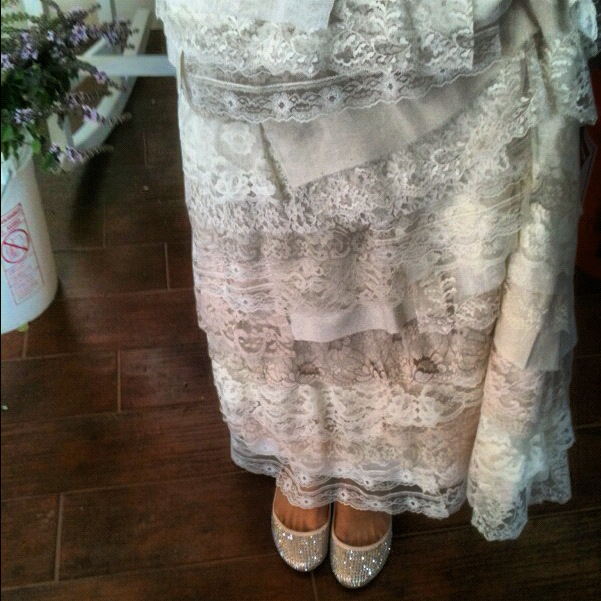 my white wedding dress six months ago with a touch of pink lace at the 