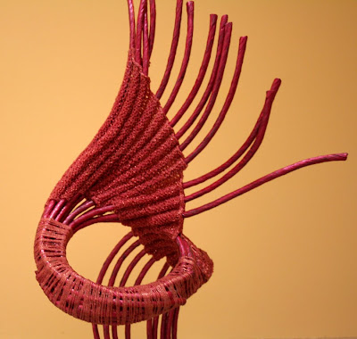 sculptural piece made with tubular knitting and sticks, made by Passle Helminski, blind since 15 years old, with Bilateral Cortical Dipolopia Palinopsia