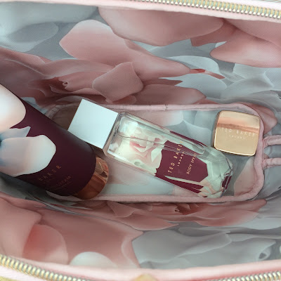 Inside the Ted Baker toiletry bag with floral lining