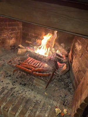 Picture of sausages on a fire