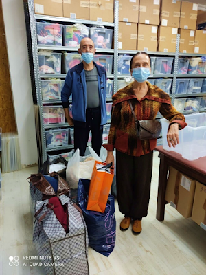 Couple in need receives Israel Relief Aid clothing from Ashdod Aid Center