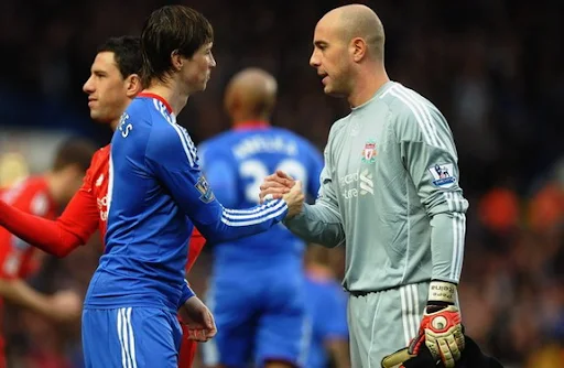 Chelsea striker Fernando Torres shakes hands with former Liverpool team-mate Pepe Reina