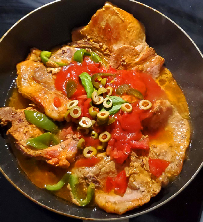 a latin style pork made with sazon all in one pan