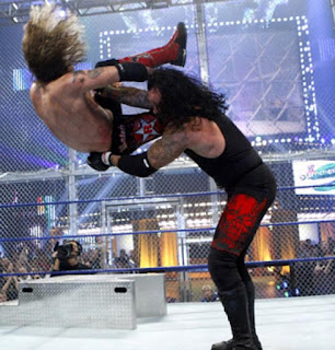 WWE SummerSlam Undertaker chokeslam Edge Hell in a Cell Steel Steps