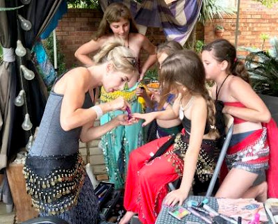 Make-up girl doing nails at party