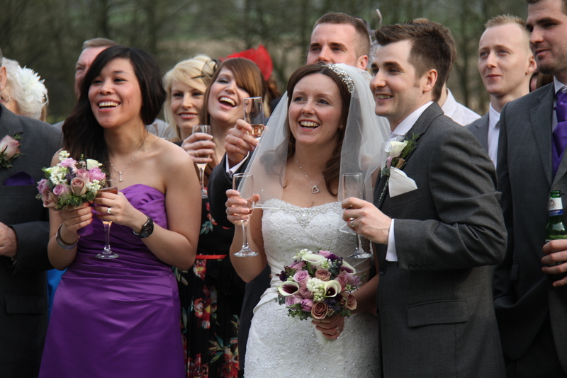 Emma's wedding bouquet was a glorious collection of deep purple and ivory