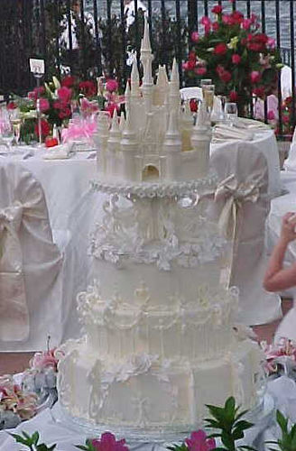 Amazing traditional white Disney castle wedding cake fit for a princess