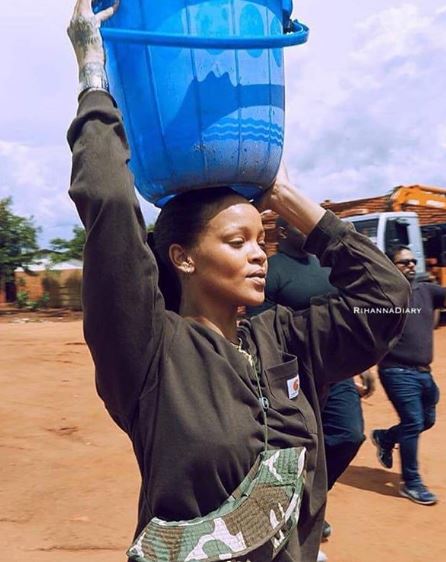 Checkout Photos of United State Superstar singer, Rihanna in Malawi Fetching Water, Helping The Poor yesterday (Photos)