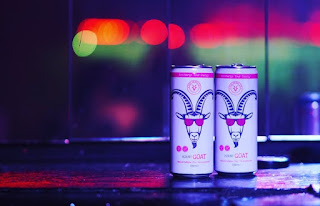 2 cans of Horny Goat Alcohol Free energy beverage on a nightclub bar