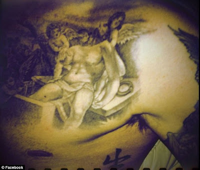 david beckham tattoos jesus. Masterpiece: The tattoo took