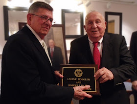 Founding School Committee members Robert J. Rappa, of Franklin, and Louis E. (Ted) Hoegler, of Walpole, pose for photo