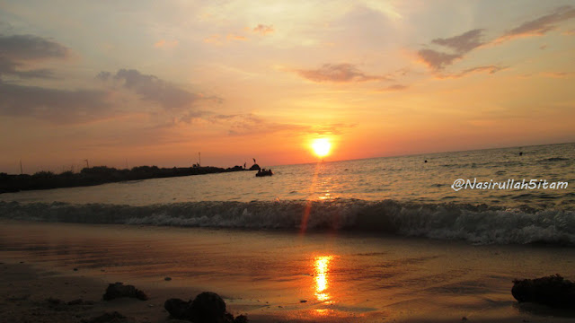 Hai sunset di pantai