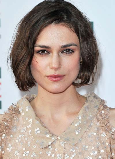 Keira Knightley Actress Keira Knightley was snapped cosying up and kissing