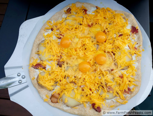 This pizza combines bacon, eggs, and potatoes with 2 kinds of cheese for a sensational savory breakfast pizza any time of day.