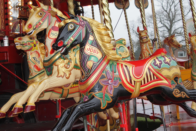 Carters Steam Fair Gallopers ride horses.