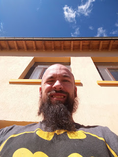 Blue sky and smiling Beard