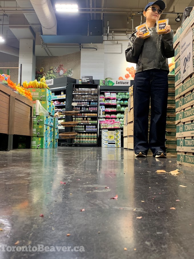 Human Poses With Cheddar Cheese At Sobeys Urban Fresh On Fort York Blvd