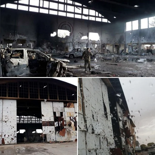 Image Attribute: Photos from the air base seem to show a Syrian soldier inspecting a large hangar-style building with heavy damage. / Source: Tasnim News Agency's Twitter handle.