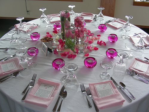 black and hot pink wedding centerpieces. white wedding table settings.