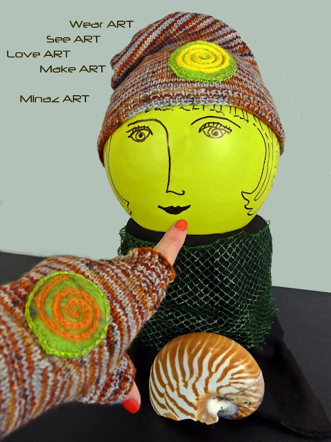 Spiral Orange Knit Slouchy Hat & Fingerless Gloves by Minaz Jantz